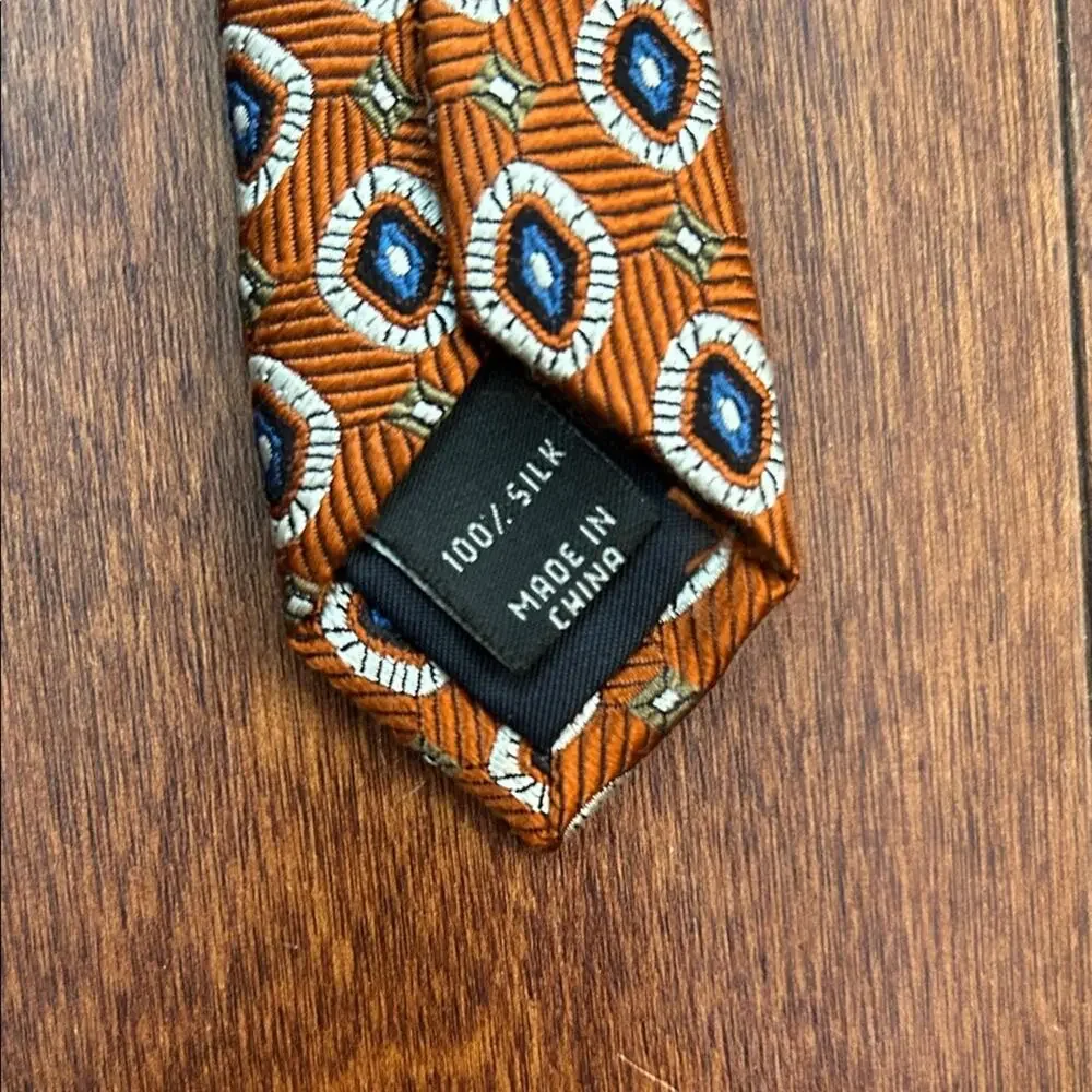 Jos. A. Bank 100% Silk Rust and Navy Woven Tie